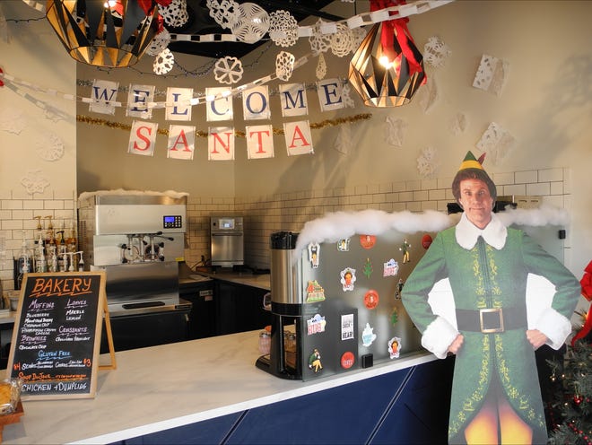 The Better Together Café in South Milwaukee is featuring an "Elf"-themed pop-up throughout December with decorations owner Becky Kinzer said were designed to make the business "look like Gimbels" from the film. They even have a Buddy the Elf-themed shake available.