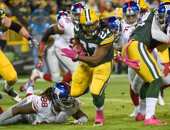 Green Bay Packers running back Eddie Lacy (27) gains yardage during the game against the New York Giants at Lambeau Field on Oct. 9, 2016. The Packers won 23-16.