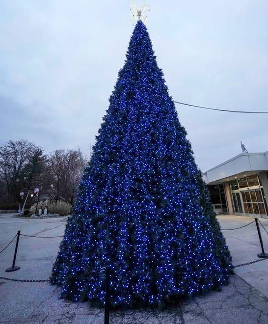 A Pixel Tree seen Tuesday, Dec. 5, 2023, at the Milwaukee County Zoo. This tree plays music and performs a beautiful light show featuring animals. Ebony Cox / Milwaukee Journal Sentinel