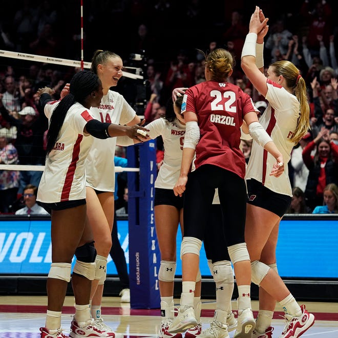 Wisconsin celebrates their victory over Penn State in the NCAA Regional Volleyball semifinal match on Thursday December 7, 2023 at the UW Field House in Madison, Wis.