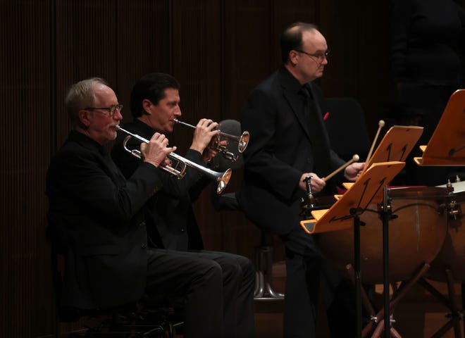 Trumpeters Alan Campbell, left, and Matthew Ernst and timpanist Dean Borghesani perform Handel's "Messiah" Dec. 8 with the Milwaukee Symphony Chorus and Orchestra.