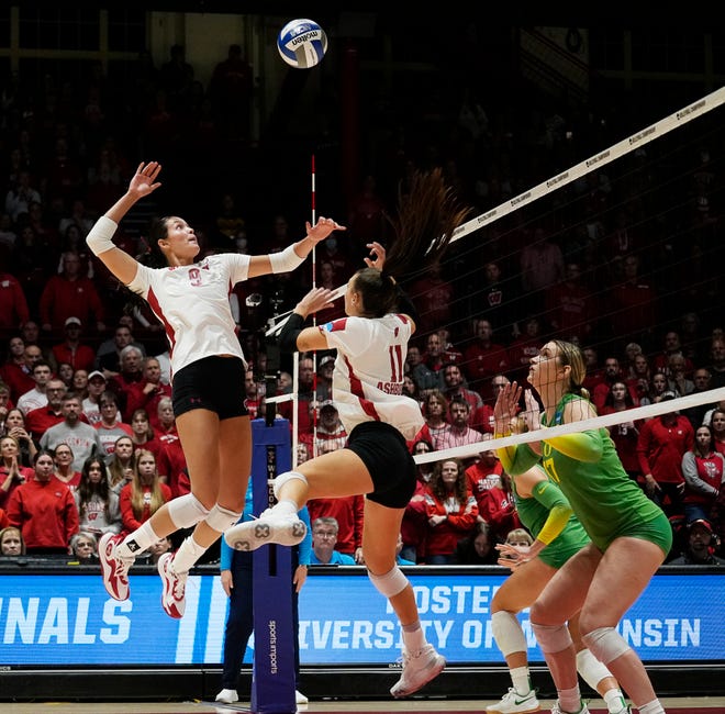 Wisconsin middle blocker Caroline Crawford (9) goes for a spike during the third set of the NCAA Regional Volleyball Finals match against Oregon on Saturday December 9, 2023 at the UW Field House in Madison, Wis.