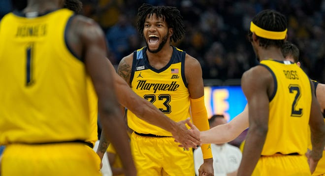 Marquette forward David Joplin (23) reacts after getting an assist during the first half of their game against Notre Dame Saturday, December 9, 2023 at Fiserv Forum in Milwaukee, Wisconsin.