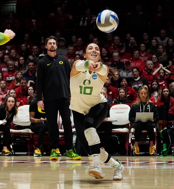 Oregon libero Georgia Murphy (10) runs to hit the return during the second set of the NCAA Regional Volleyball Finals match against Wisconsin on Saturday December 9, 2023 at the UW Field House in Madison, Wis.