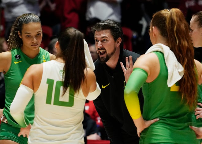 Oregon Head Coach Matt Ulmer is seen during a time out in the second set of the NCAA Regional Volleyball Finals match against Wisconsin on Saturday December 9, 2023 at the UW Field House in Madison, Wis.