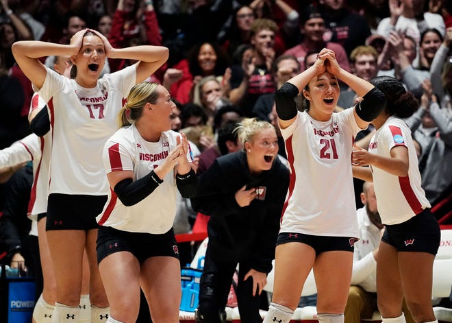Wisconsin celebrates the save during the third set of the NCAA Regional Volleyball Finals match against Oregon on Saturday December 9, 2023 at the UW Field House in Madison, Wis.